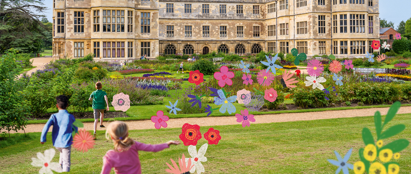 Image showing children running in the grounds of Audley End House and Gardens with colourful flowers in the air