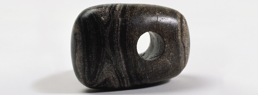 A carved, polished Breton gneiss macehead, found at Stonehenge