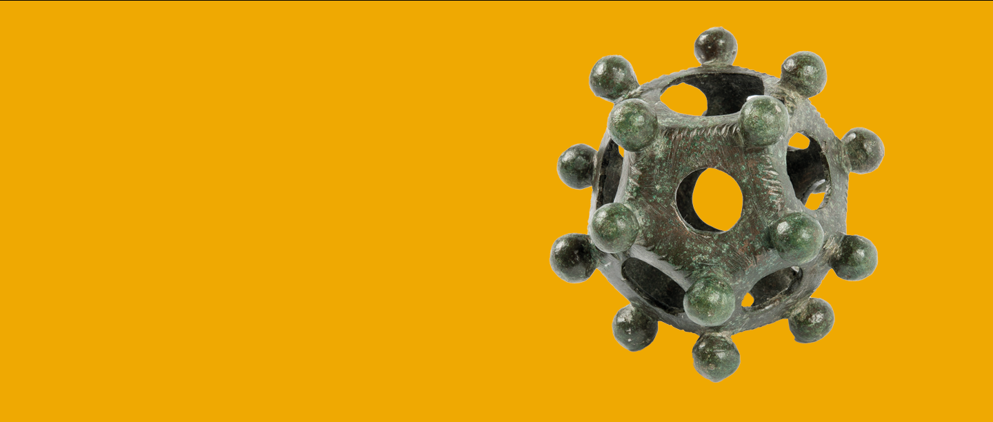 Image: Roman Dodecahedron against an orange background