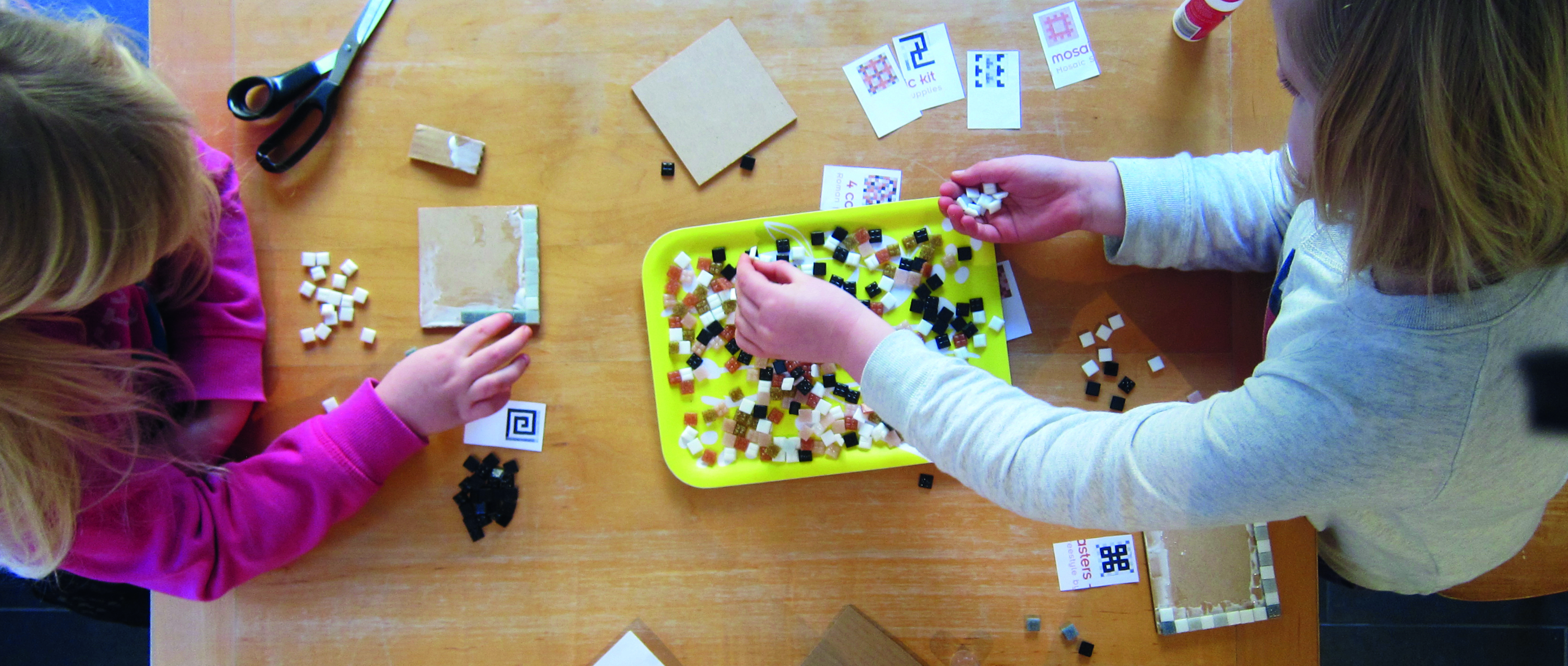 Children making Roman mosaic