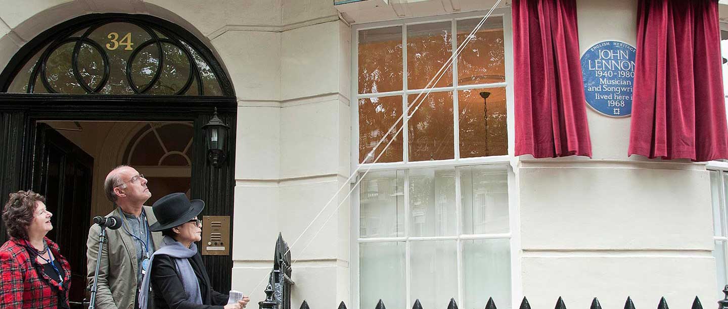 Yoko Ono unveiling a plaque to John Lennon