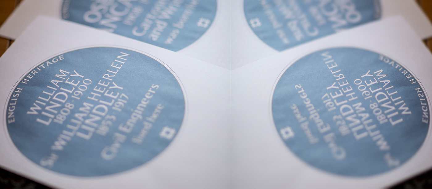 A soft focus image of the design for William Lindley's blue plaque