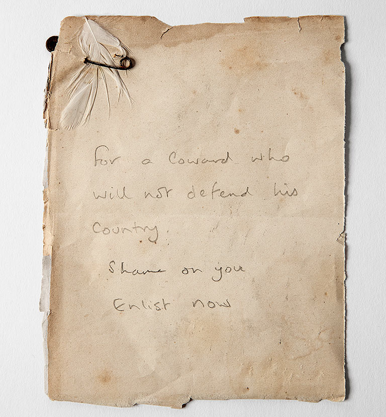 Letter with a white feather