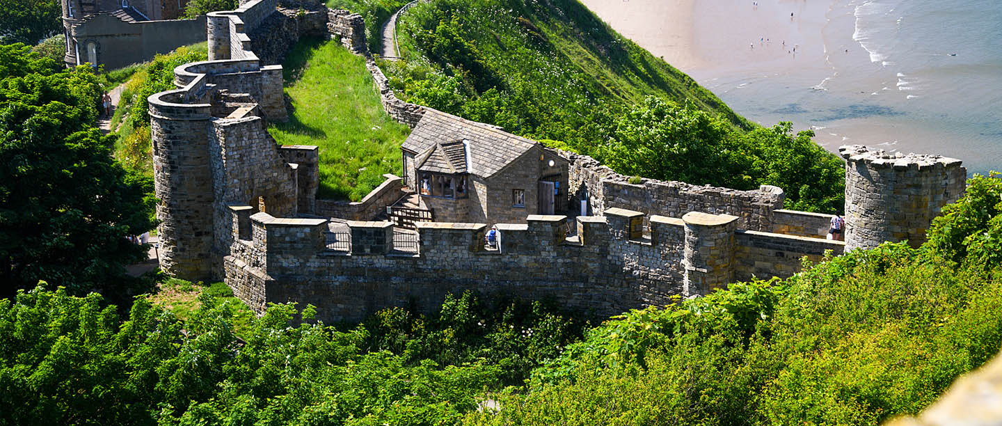 A dramatic aerial view of Scarborough Castle