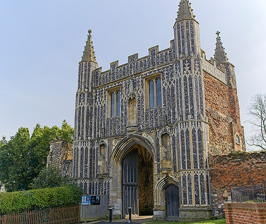 Flintwork panels adorn the elaborate north front of the gate