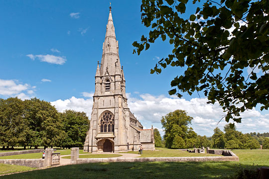 St Mary, Studley Royal, seen from the south-west, standing in its walled churchyard
